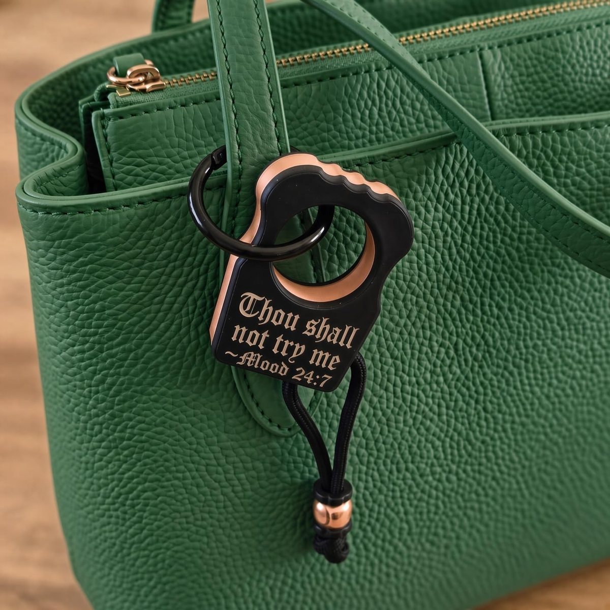 Purse Candy, rose Gold on a green bag